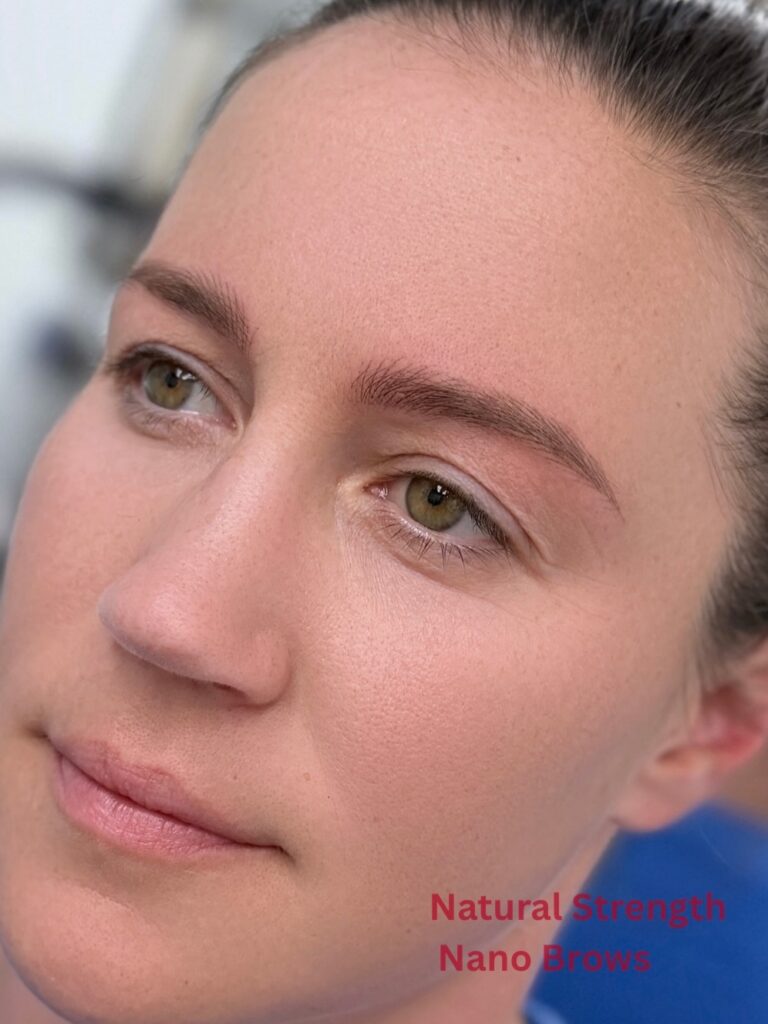 Close-up of natural strength nano brows with delicate hair-stroke texture – semi-permanent eyebrow tattoo by Sunnybrow LA in Koreatown